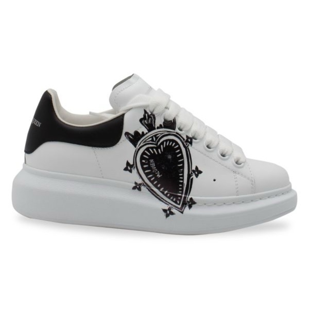 Preloved Alexander McQueen low-top sneakers, preloved, used condition.